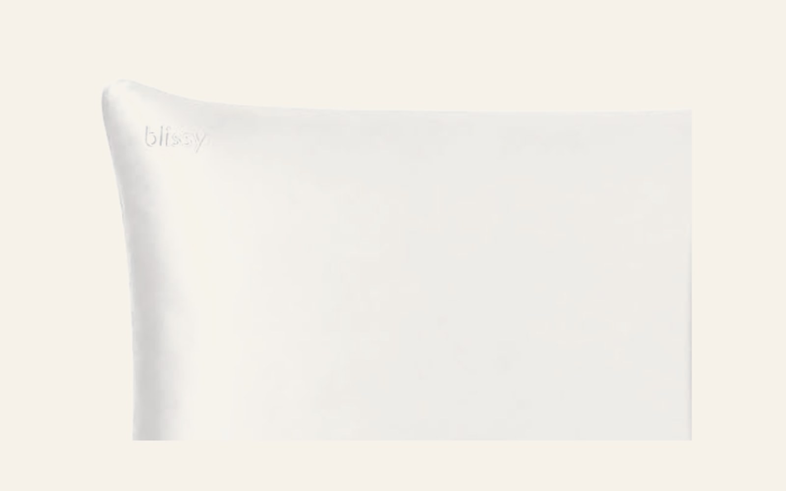 Una funda de almohada de seda de morera blanca.